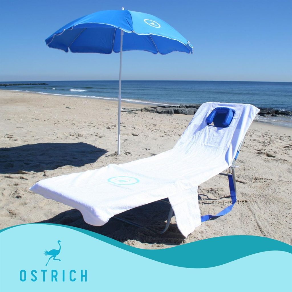 Ostrich CHS-1002B Lounge Chaise in blue unfolded on a sandy beach, featuring a face cavity, adjustable backrest, and lightweight aluminum frame—now available for $44.07 with Prime Only Deal.