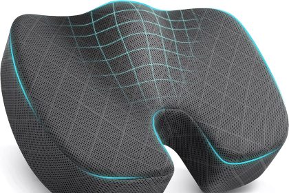 TushGuard Seat Cushion with ergonomic U-shaped design, made of high-density memory foam, shown on an office chair for tailbone and lower back support.