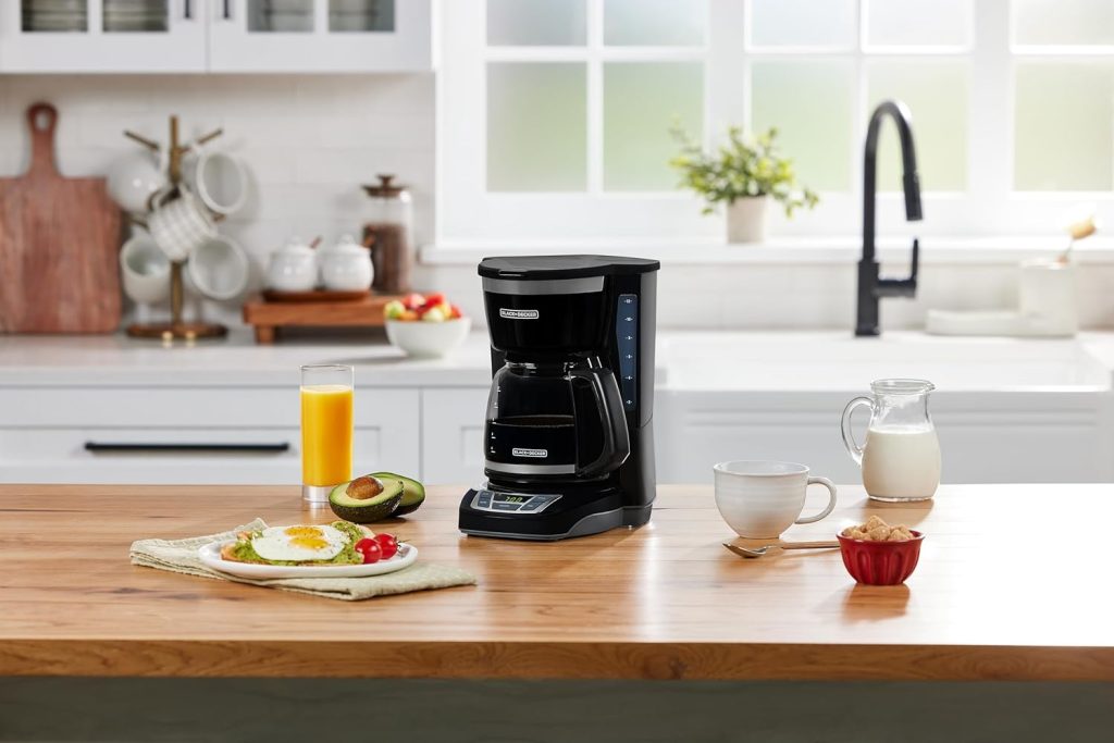 “BLACK+DECKER 12-Cup Programmable Coffee Maker CM1160B in sleek black with digital controls and glass carafe – affordable and reliable daily coffee brewer.”