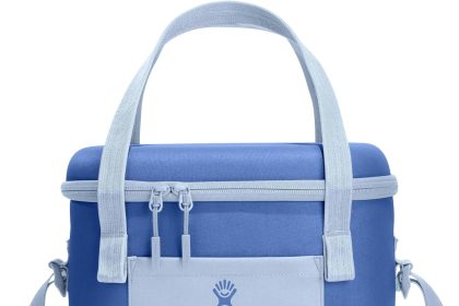 Hydro Flask insulated cooler bag in blue, keeping drinks and snacks cold for outdoor adventures.